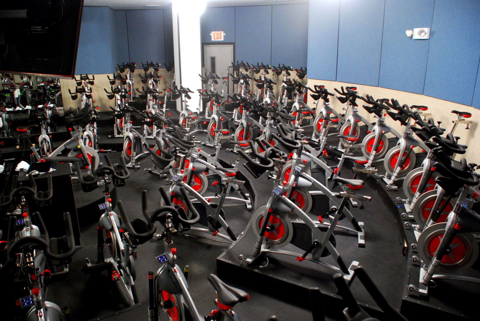 Flywheel Sports bikes in a large room.